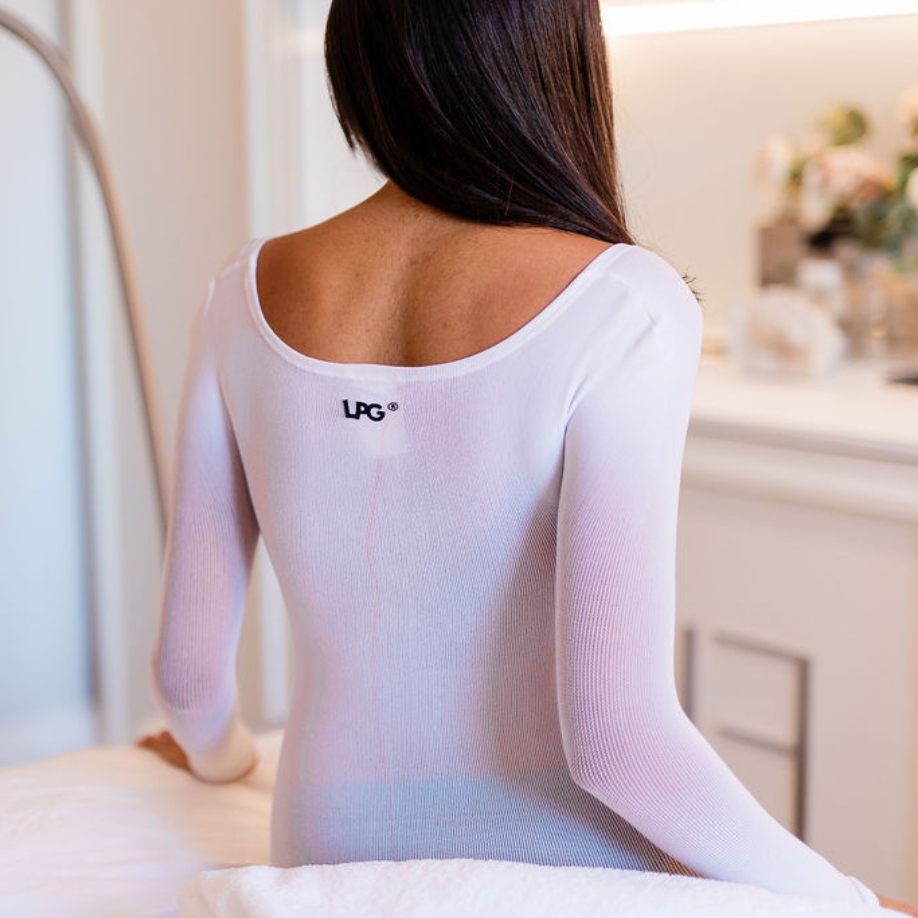 Woman relaxing before her Wellness LPG Endermologie treatment, designed to reduce stress, improve sleep quality, and promote overall well-being.